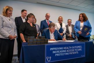 Governor McKee Improving Health Outcomes in RI