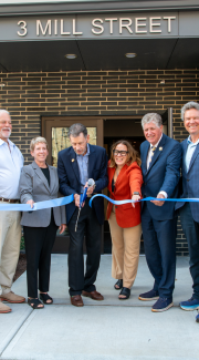 Ribbon cutting event outside of building