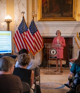 Governor Office Staff giving out a presentation